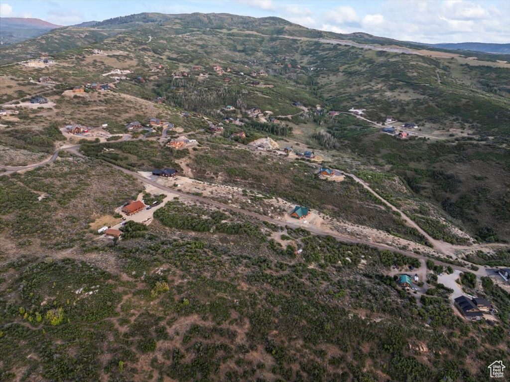 Aerial overview of property's location featuring mountains and rural landscape