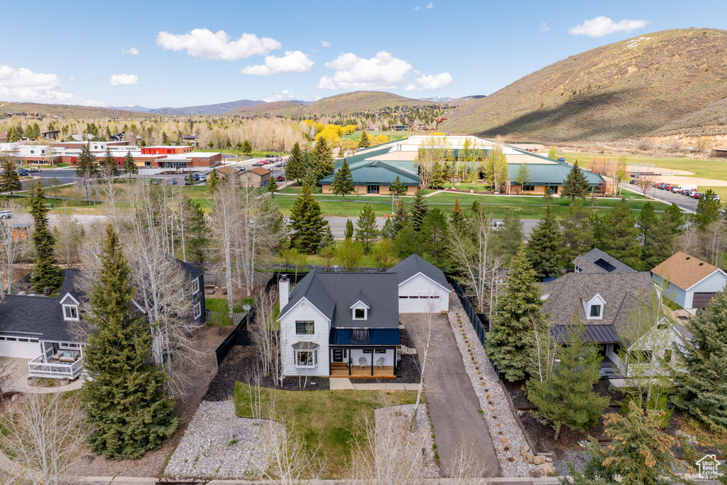 Aerial view of residential area with mountains
