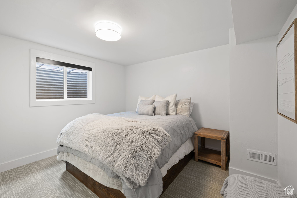 Bedroom featuring baseboards