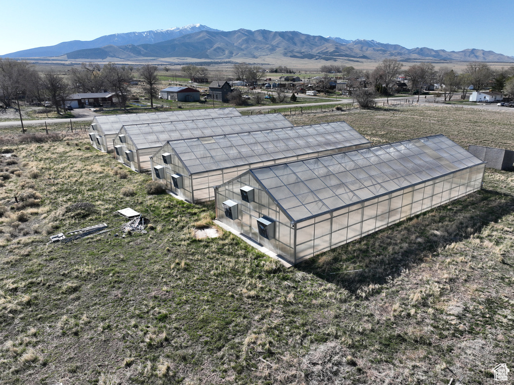 View from above of property featuring a mountain backdrop