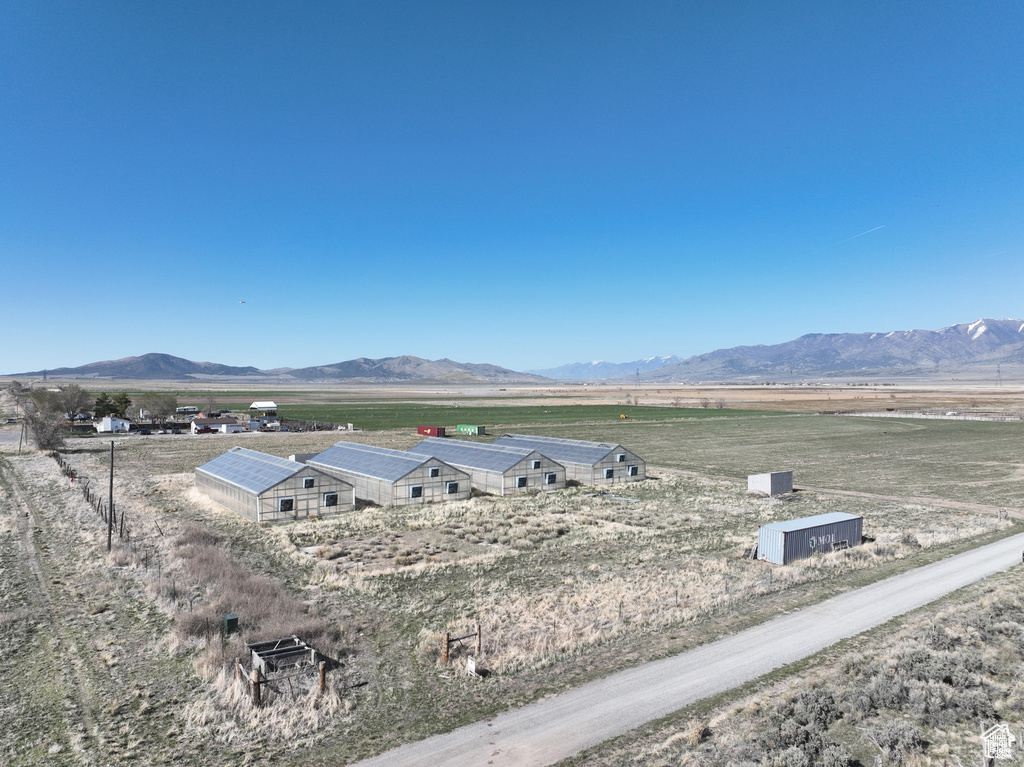 View of mountain background featuring rural landscape