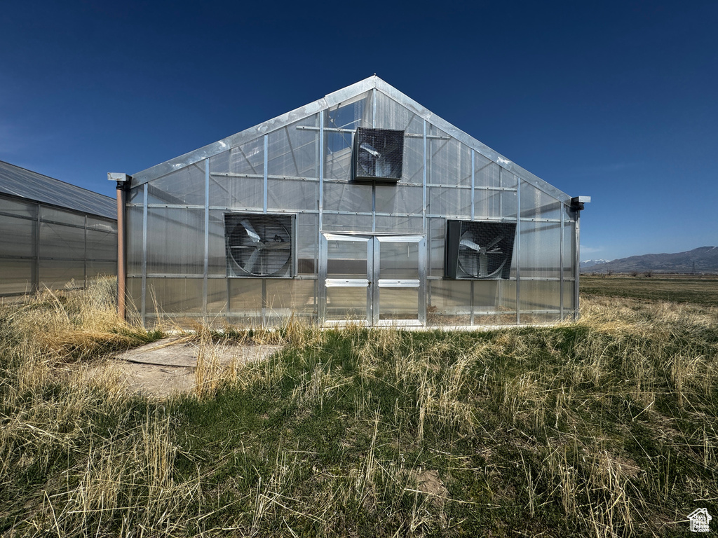 View of greenhouse featuring a mountain view