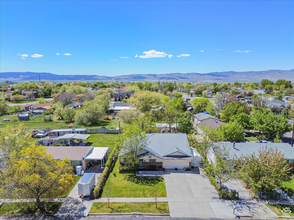 Aerial view of residential area with a mountain backdrop