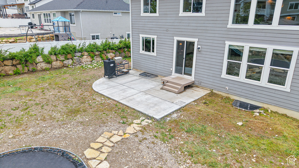 Back of house featuring a patio area and fence