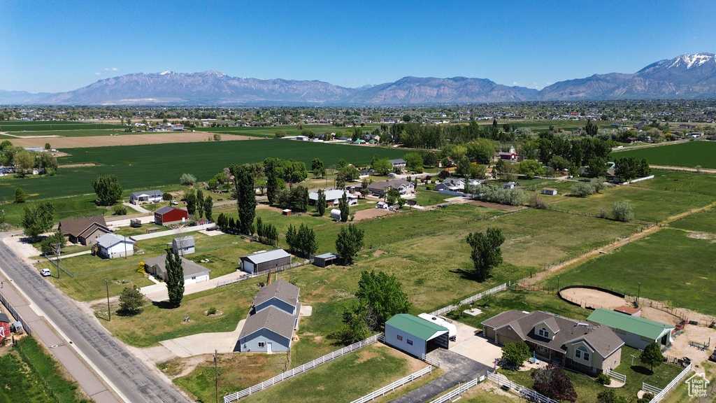 Aerial view of sparsely populated area featuring a mountain backdrop