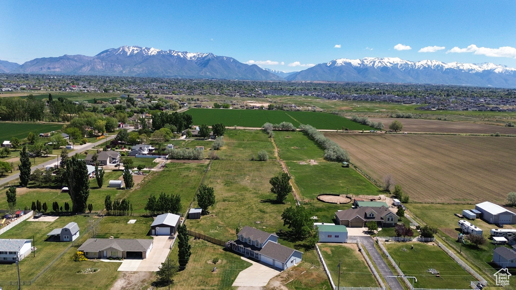 Aerial view of sparsely populated area with a mountainous background