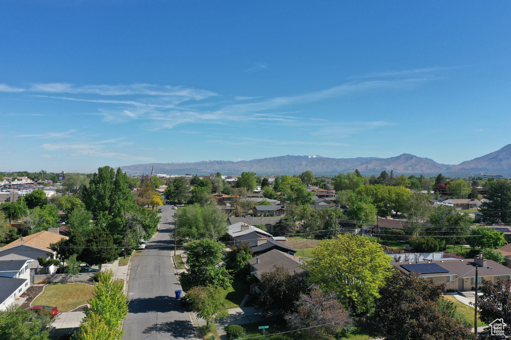 Aerial view of residential area with a mountainous background