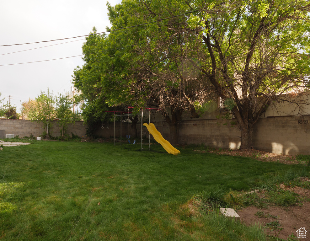 View of yard with a playground