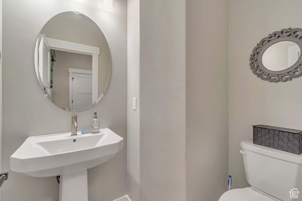 Bathroom with toilet and a sink