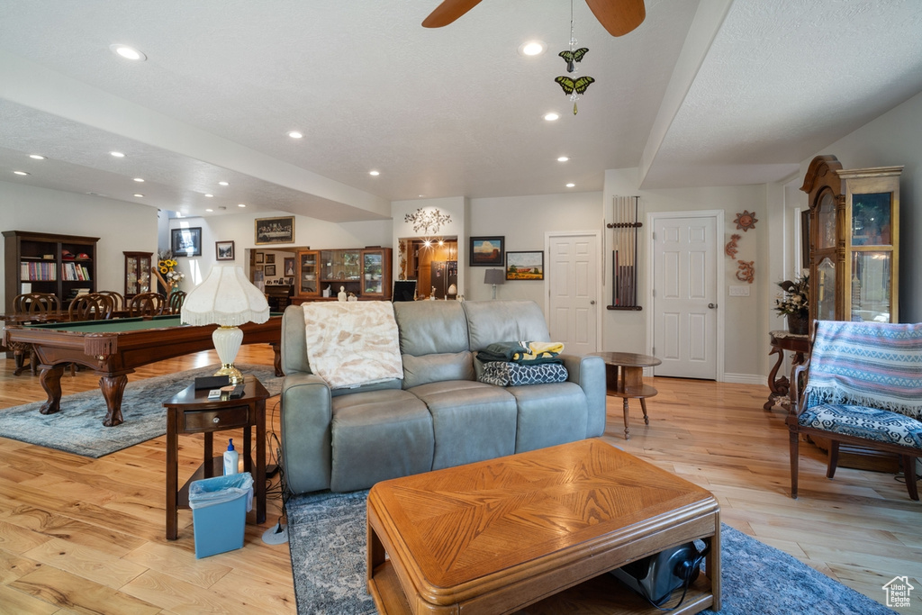 Living area with billiards table, ceiling fan, light wood-style flooring, recessed lighting, and baseboards