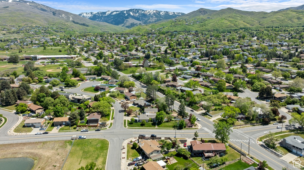 View of property location with a mountainous background and nearby suburban area