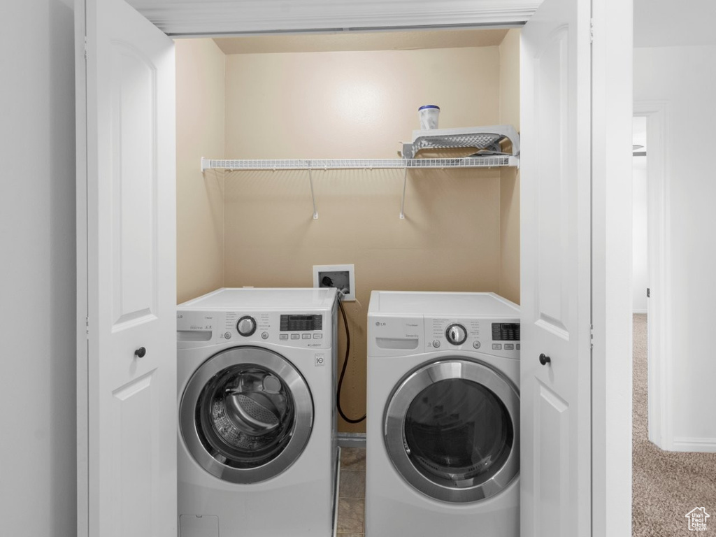 Laundry room featuring washer and dryer