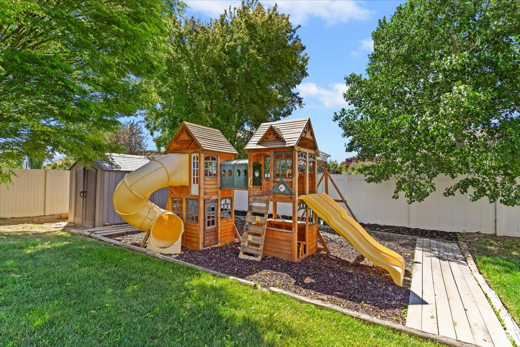 View of play area with a storage shed