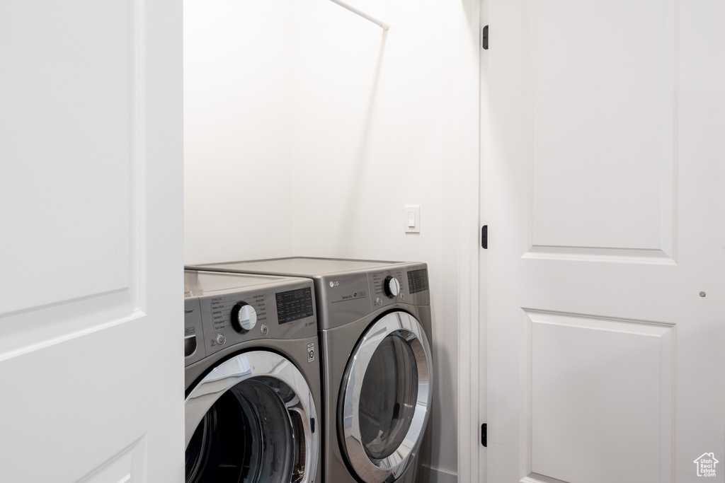 Laundry room with separate washer and dryer