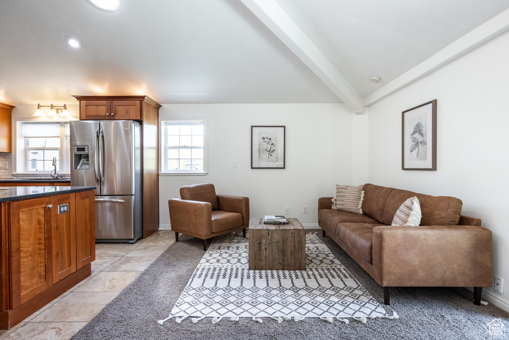 Living room featuring baseboards and recessed lighting