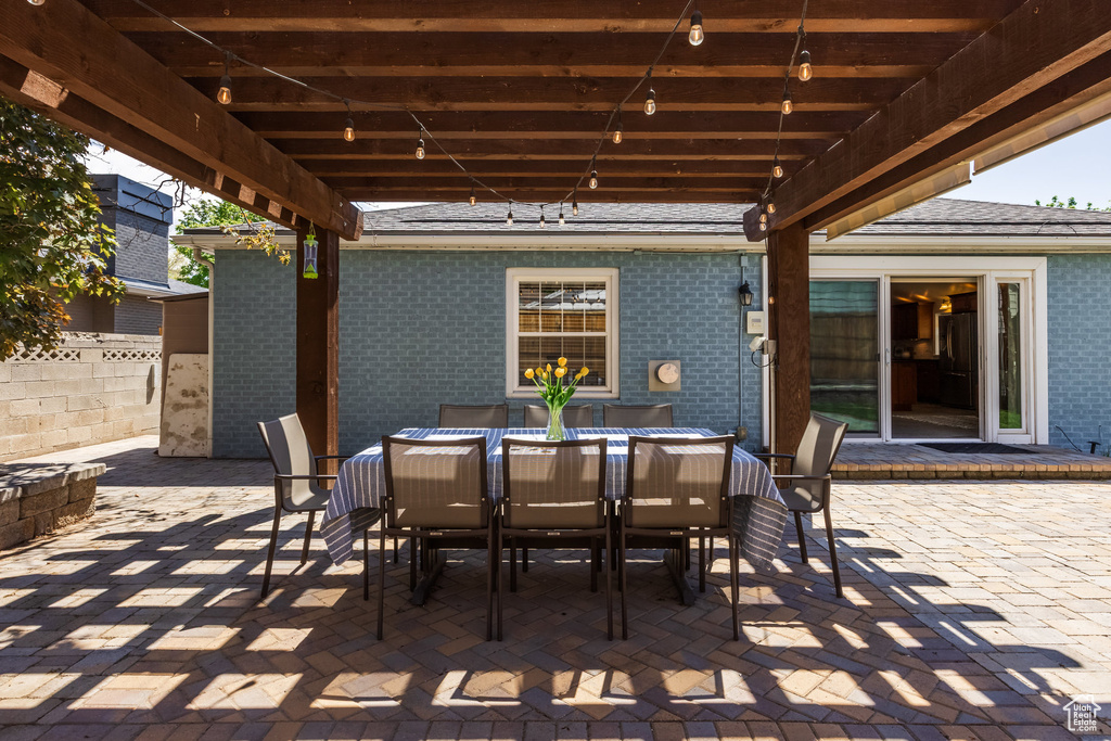 View of patio / terrace featuring outdoor dining space and a pergola