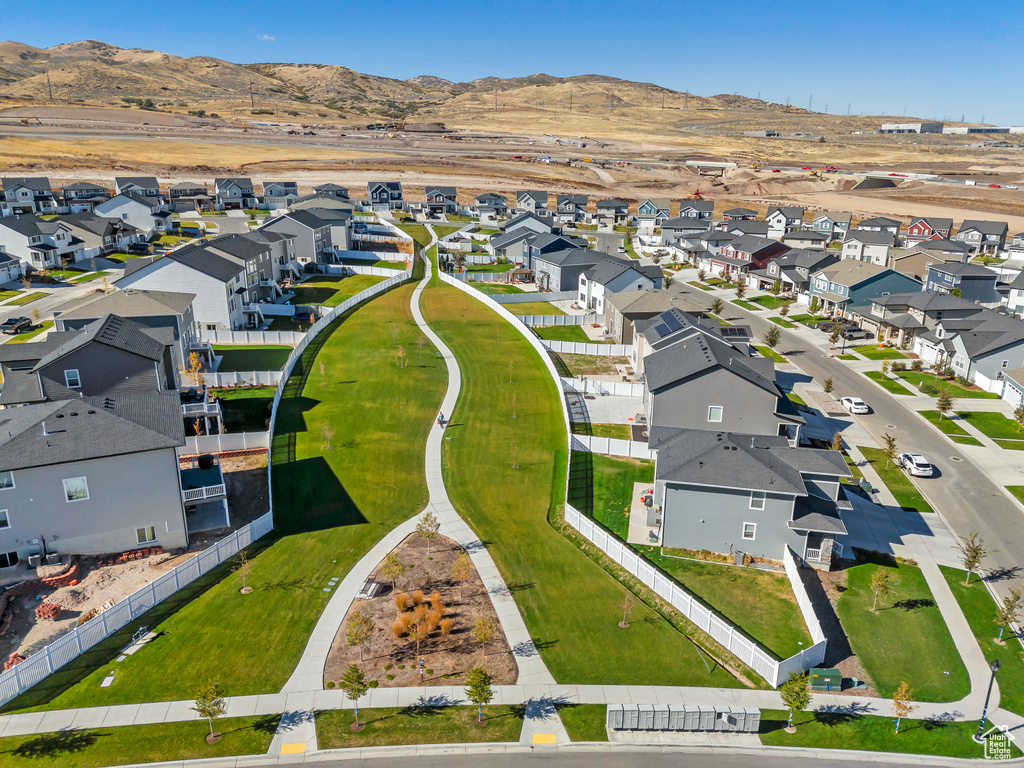 Aerial view of residential area with a mountain backdrop