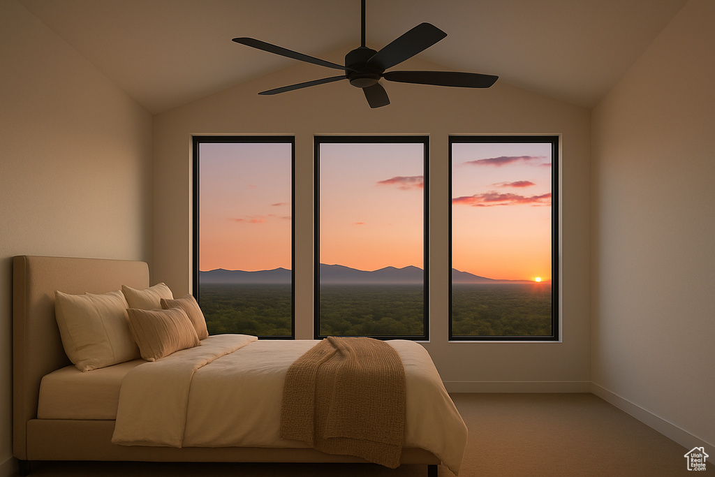 Carpeted bedroom featuring vaulted ceiling, baseboards, a mountain view, and a ceiling fan