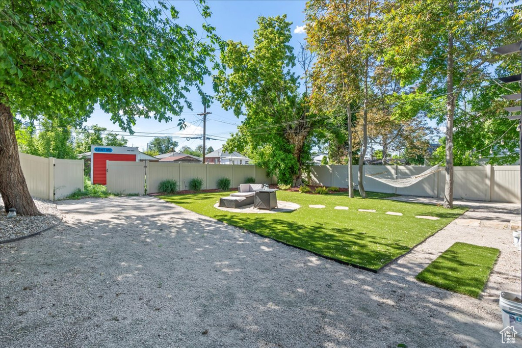 View of yard with a gate