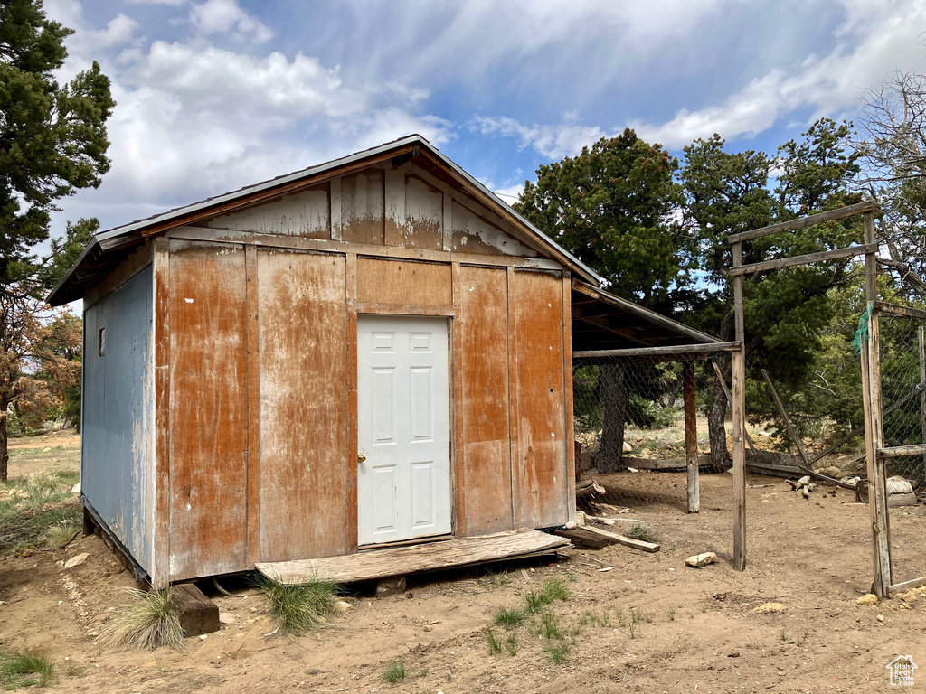 View of outbuilding featuring an outdoor structure