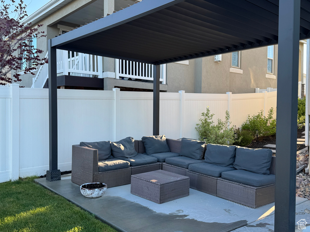 View of patio / terrace featuring fence and outdoor lounge area