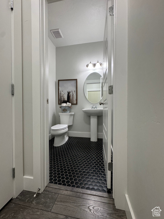 Bathroom with toilet and a sink