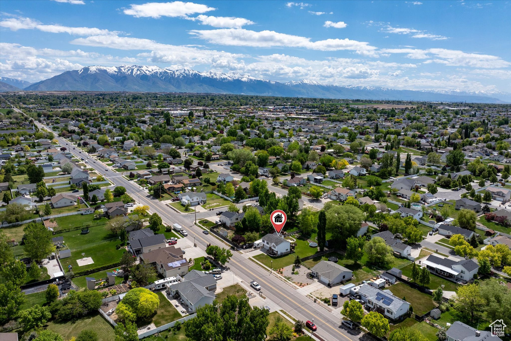 Aerial view of residential area with a mountain backdrop