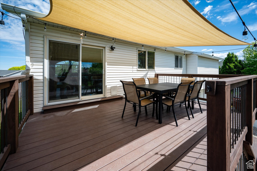 Wooden deck with outdoor dining space
