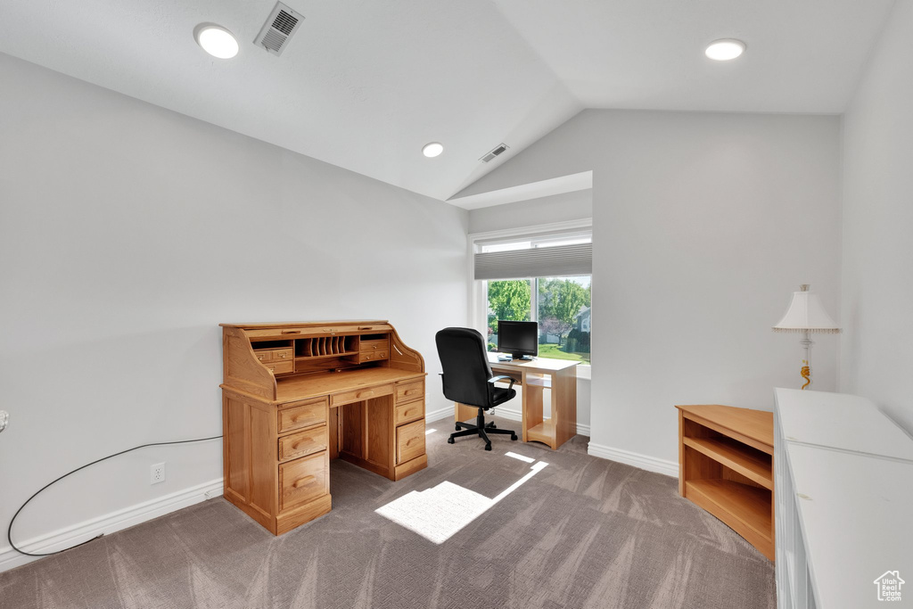 Office space with lofted ceiling, carpet flooring, recessed lighting, and baseboards