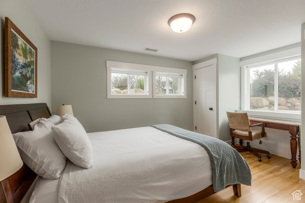 Bedroom featuring light wood-style flooring