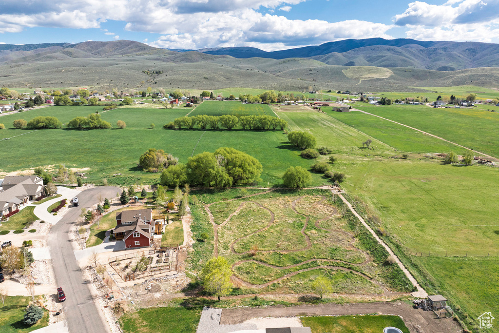 View of property location with rural landscape, mountains, and a pastoral area