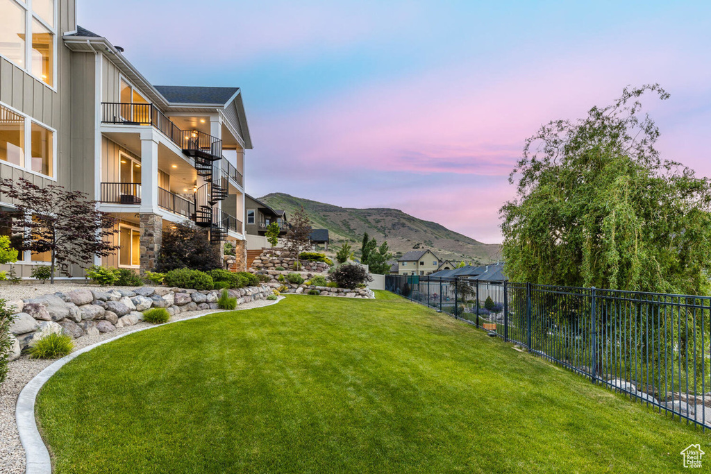 View of yard featuring stairway and a mountain view