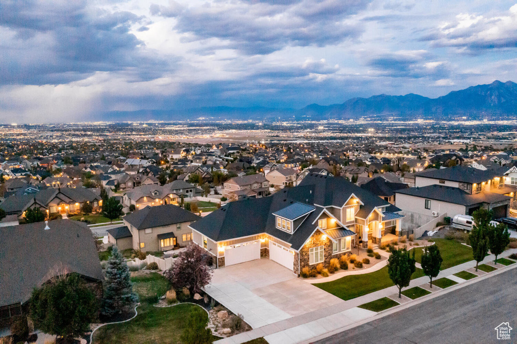 Aerial view of residential area with a mountain backdrop