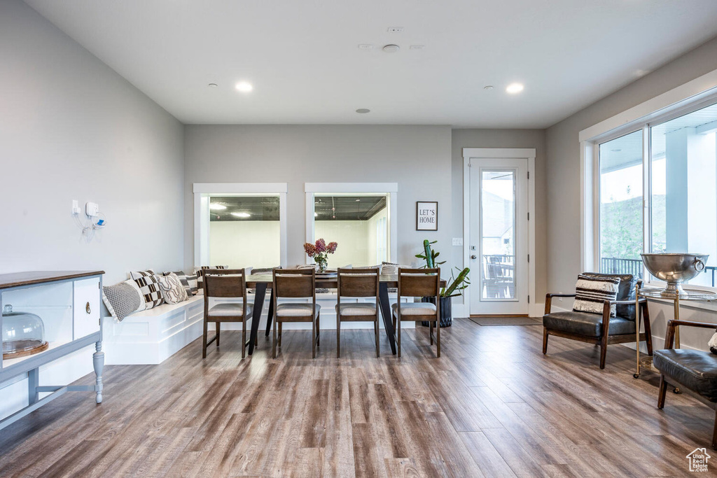 Dining space featuring wood finished floors and recessed lighting