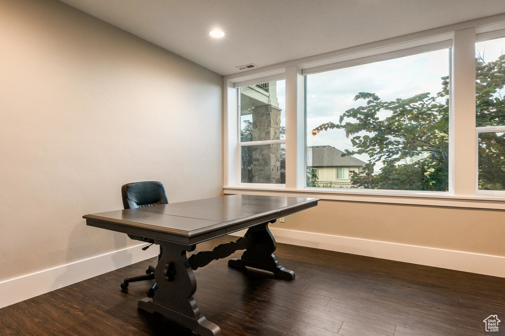 Office area with dark wood-type flooring, recessed lighting, and baseboards