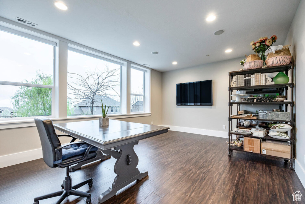 Office area featuring baseboards, recessed lighting, and wood finished floors