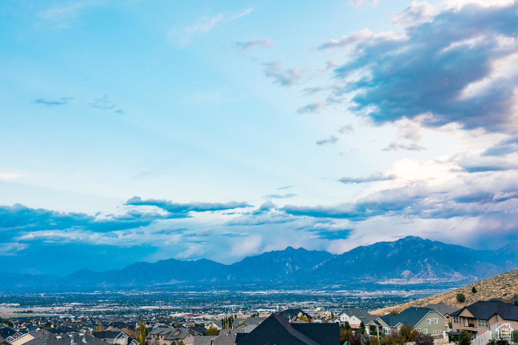 View of mountain background featuring nearby suburban area