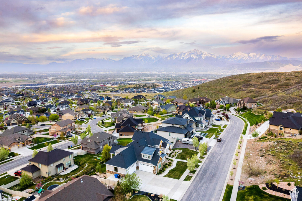 Aerial view at dusk of a mountain view and a residential view