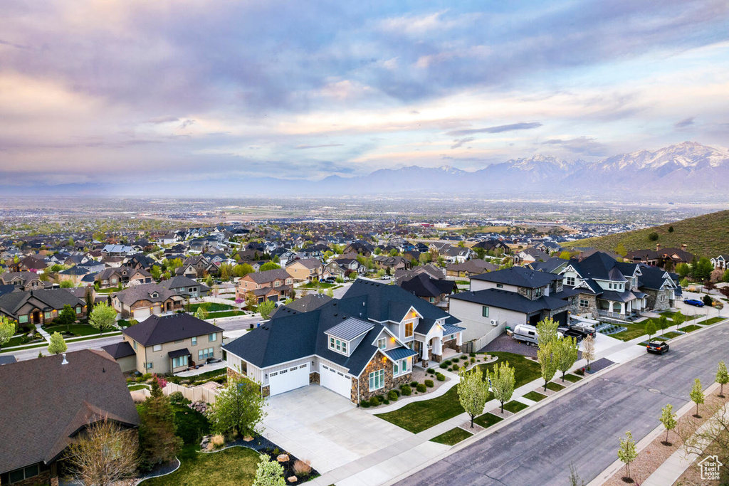 Aerial view at dusk of a residential view and a mountain view