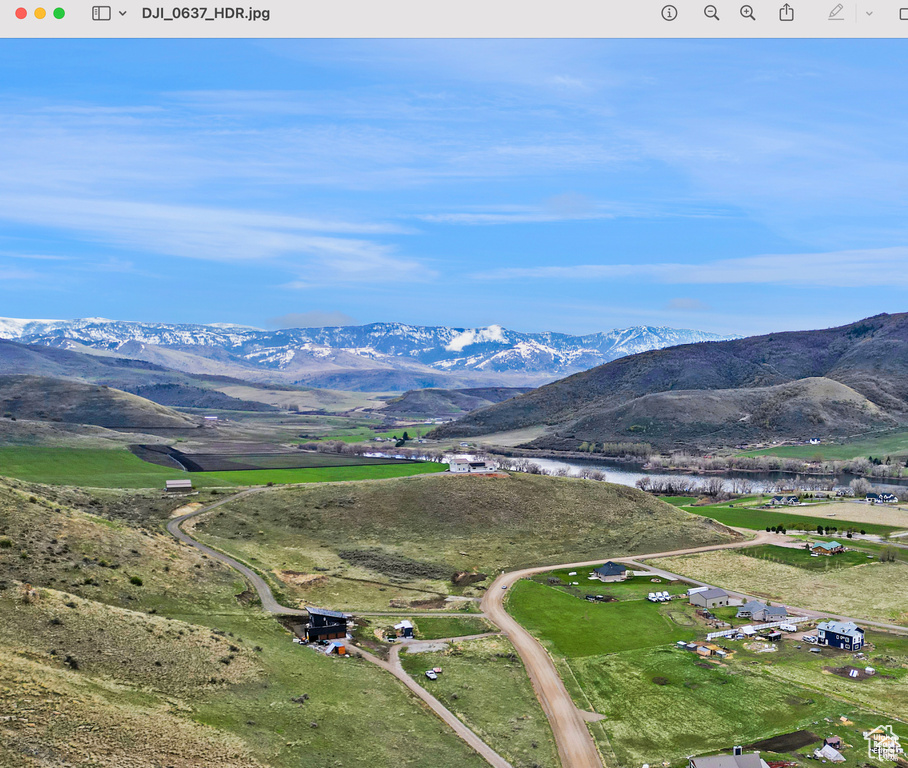Mountain view featuring a large body of water