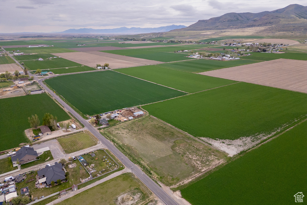 Aerial overview of property's location with mountains and rural landscape