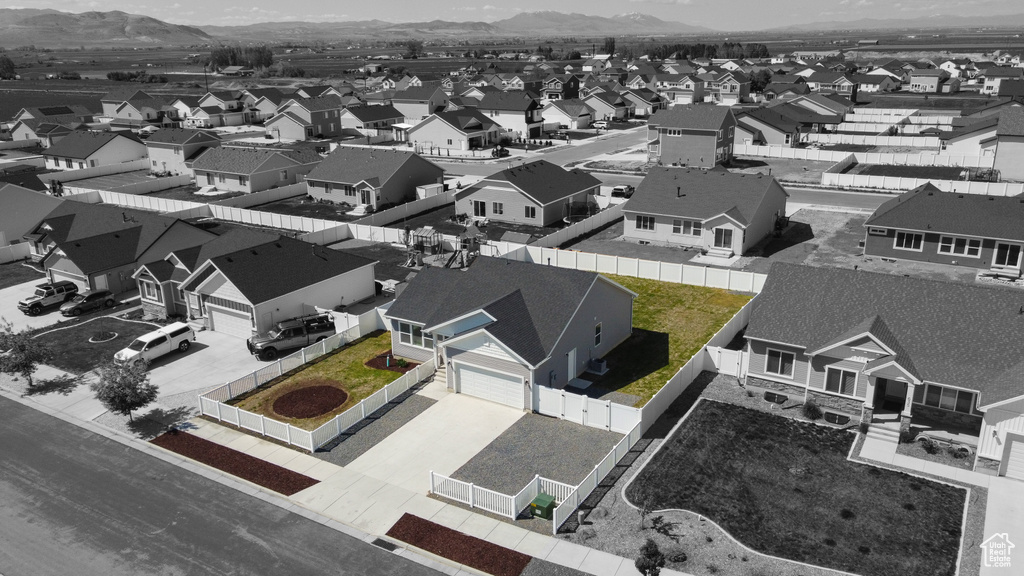 Aerial perspective of suburban area featuring mountains