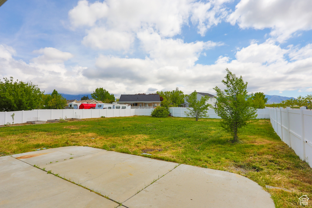View of yard with a patio area
