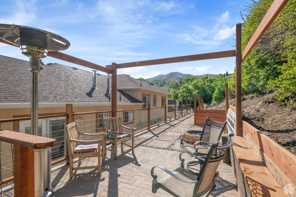 View of patio featuring a mountain view