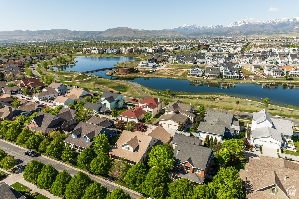 Aerial view of residential area featuring a water and mountain view