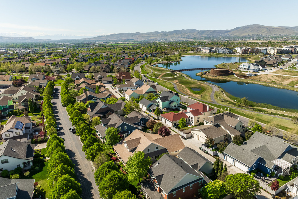Aerial perspective of suburban area featuring a water and mountain view