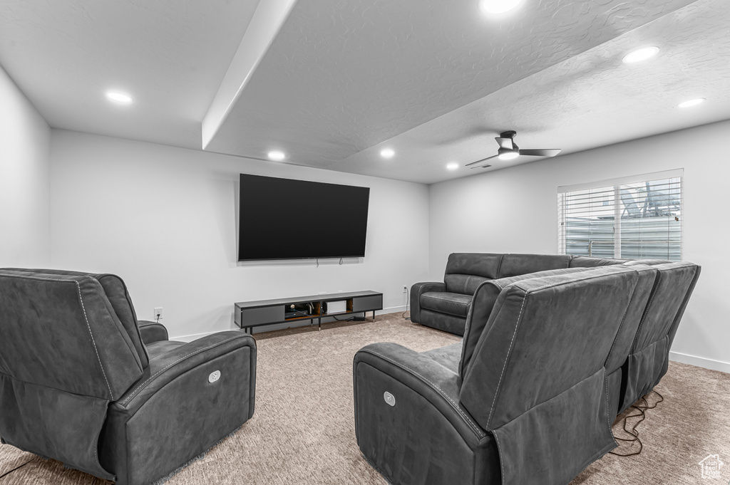 Cinema room with carpet floors, recessed lighting, baseboards, and a ceiling fan