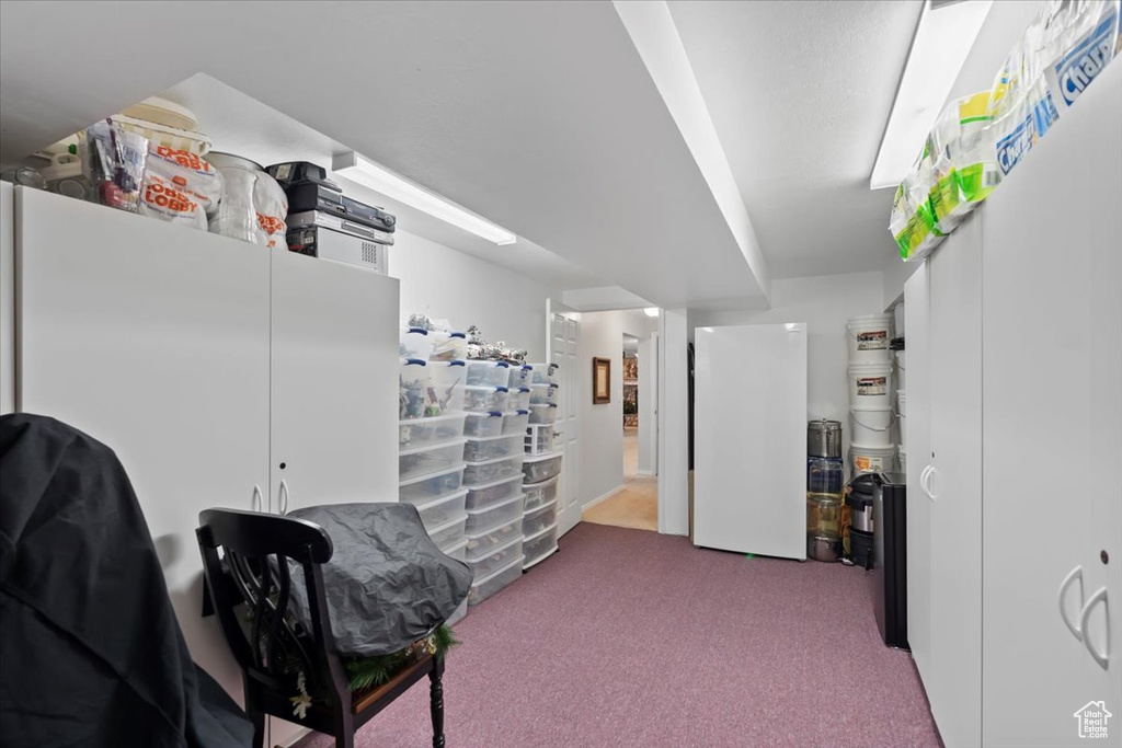 Living area featuring carpet flooring