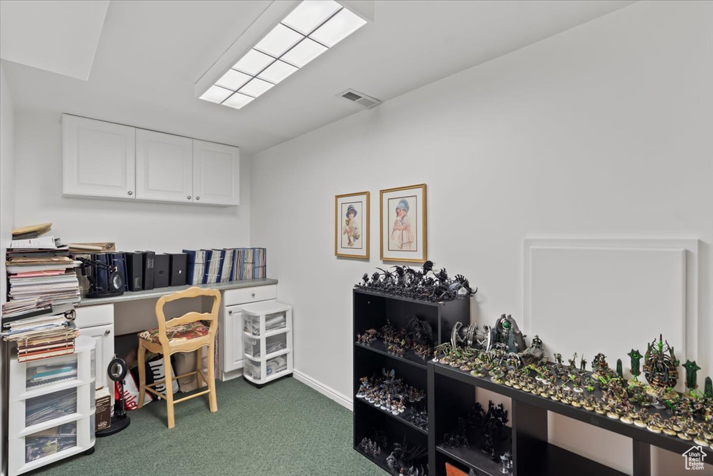 View of carpeted home office