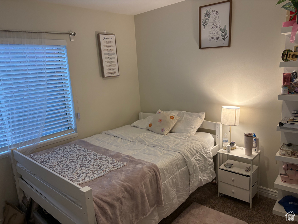 Bedroom with carpet flooring
